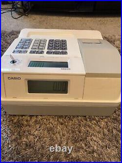 Casio SE-G1 Cash Register With Operation Key, 1 Used Roll And 10 Spare Rolls